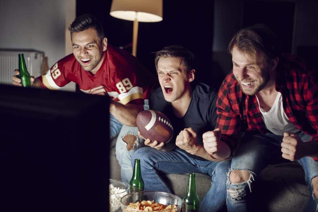 Excited-Men-Supporting-Their-Team-Scaled-1 Excited Men Supporting Their Team Scaled 1